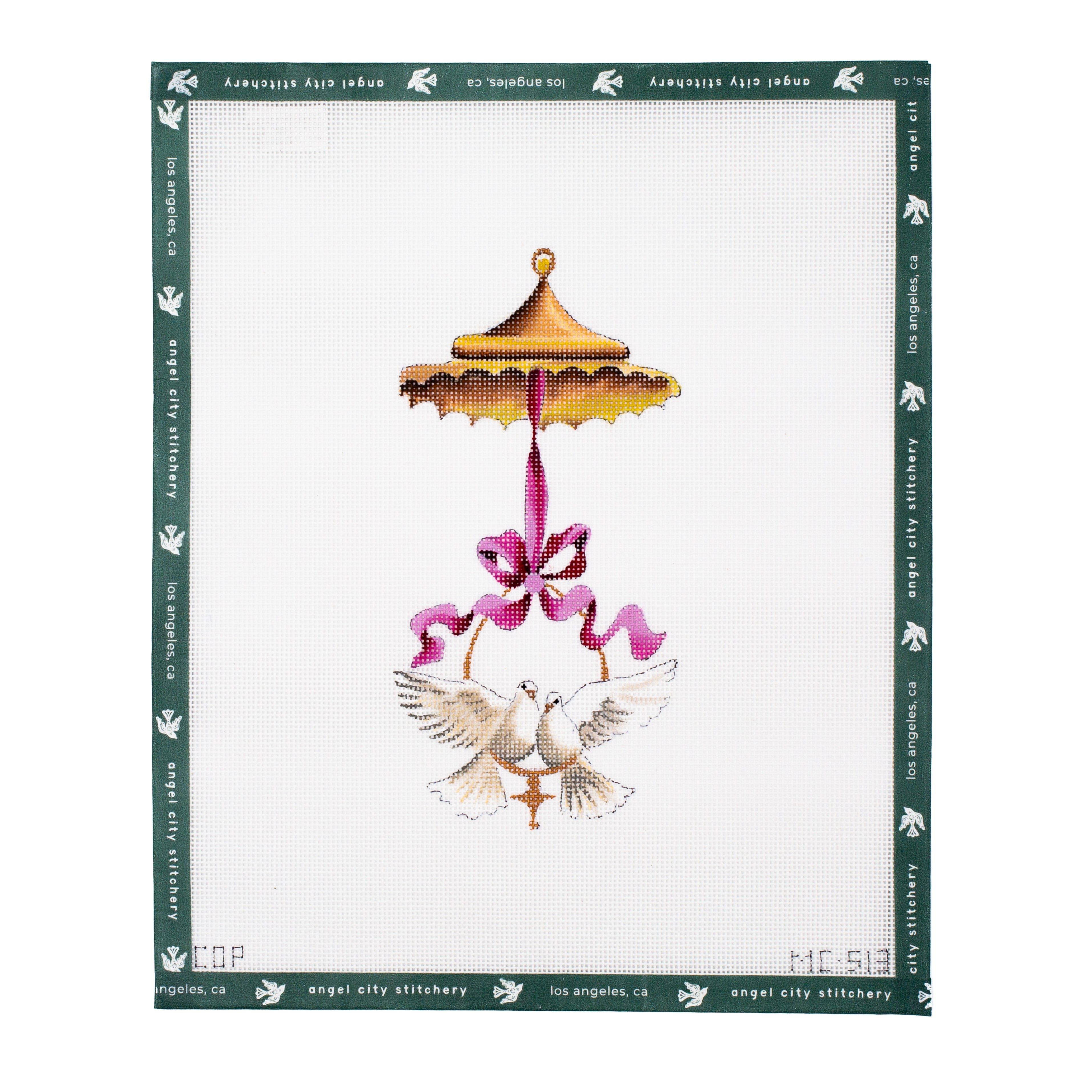 Embroidery canvas with two doves under an umbrella and pink ribbon on a white background.