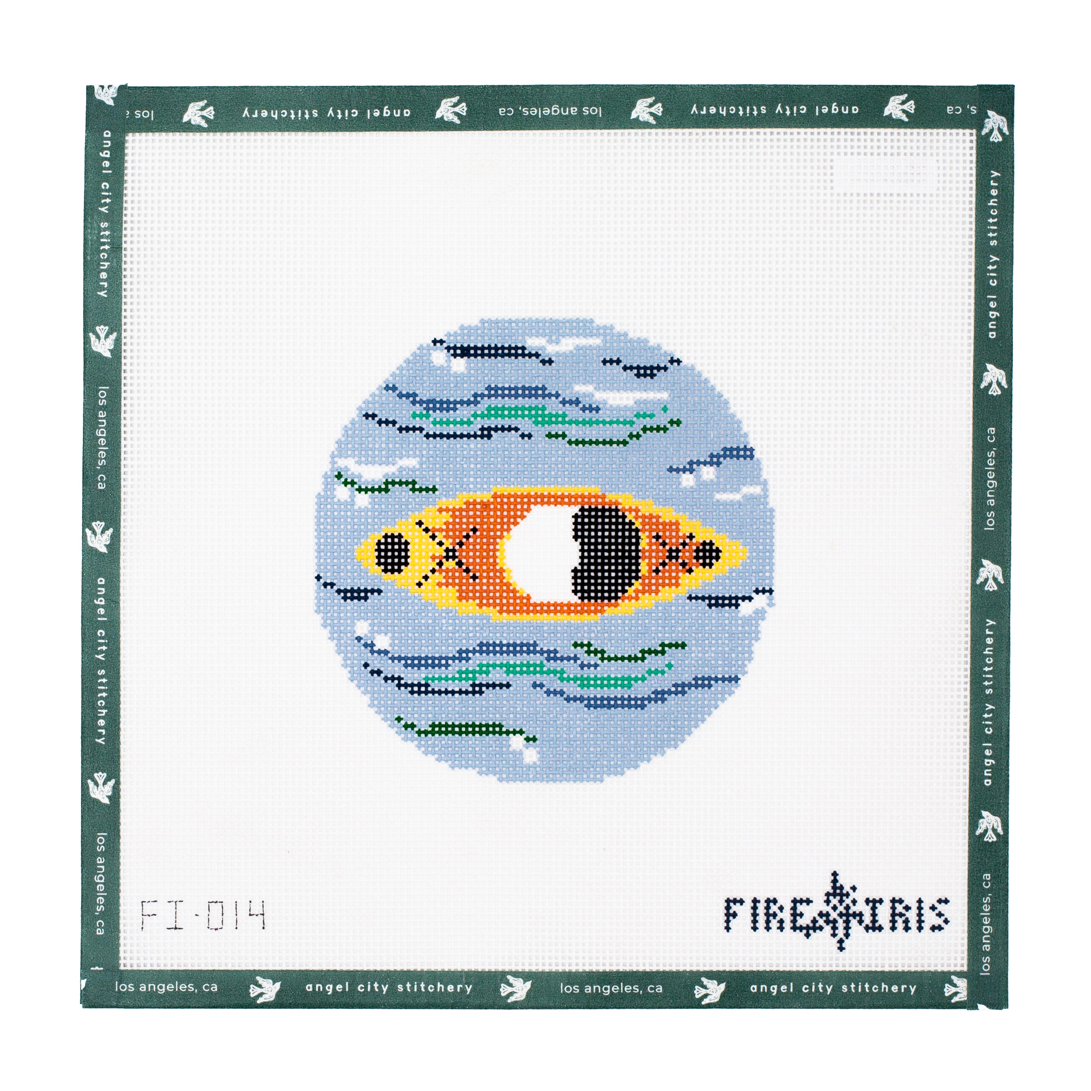 Needlepoint canvas of canoe on water with a green boarder.