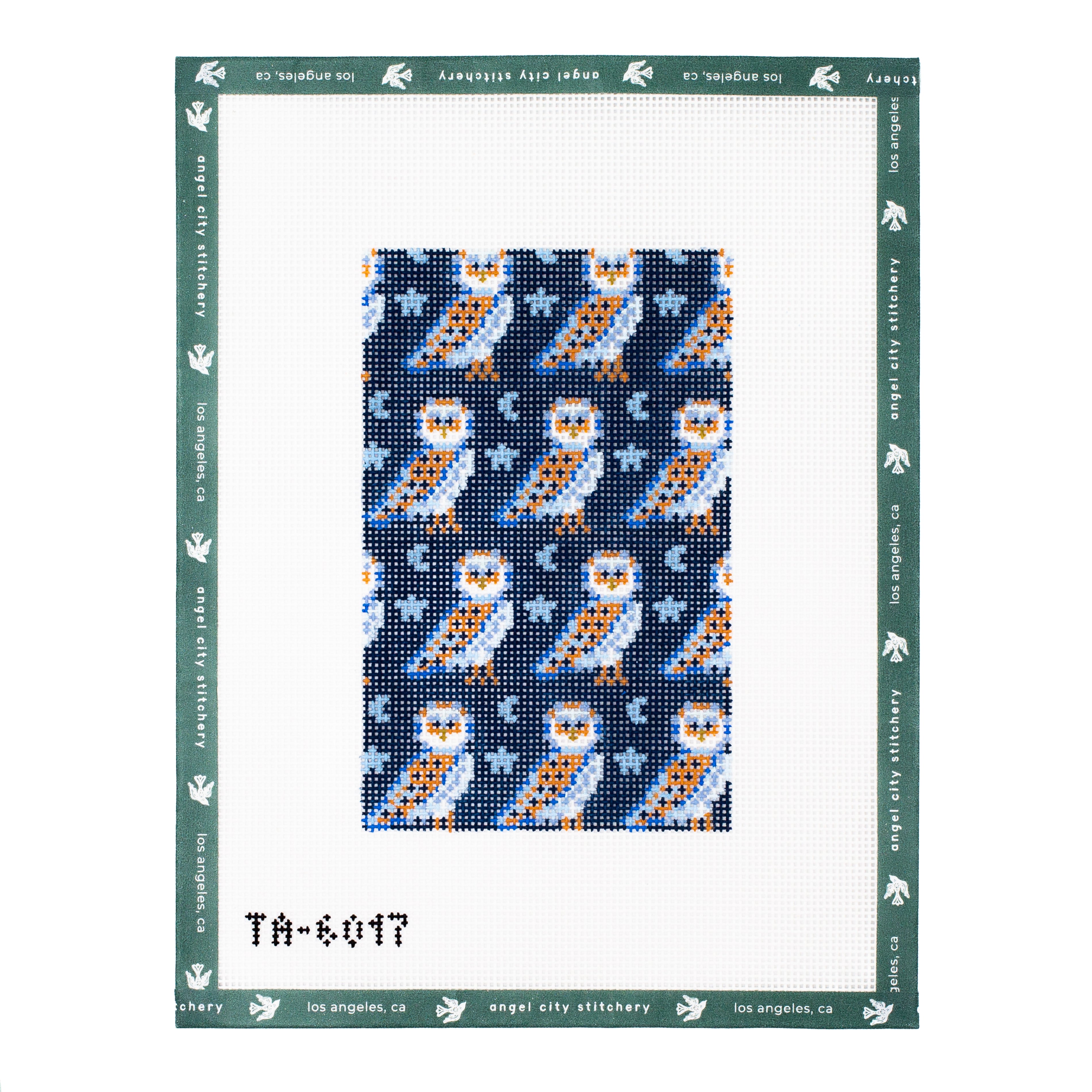 Embroidery canvas Patterned fabric with owl design on a white background