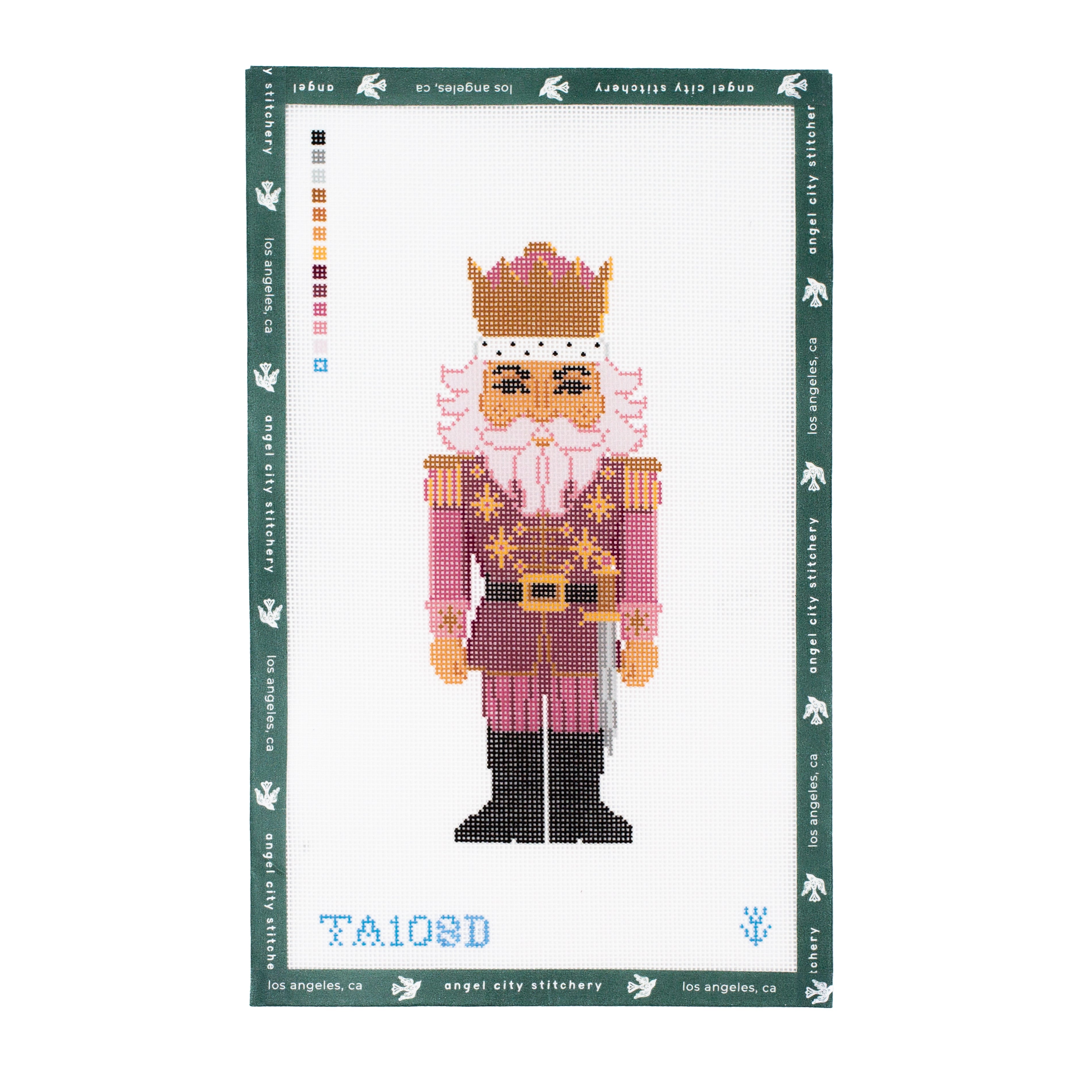 Embroidery canvas pattern nutcracker design on a white background with a green border.