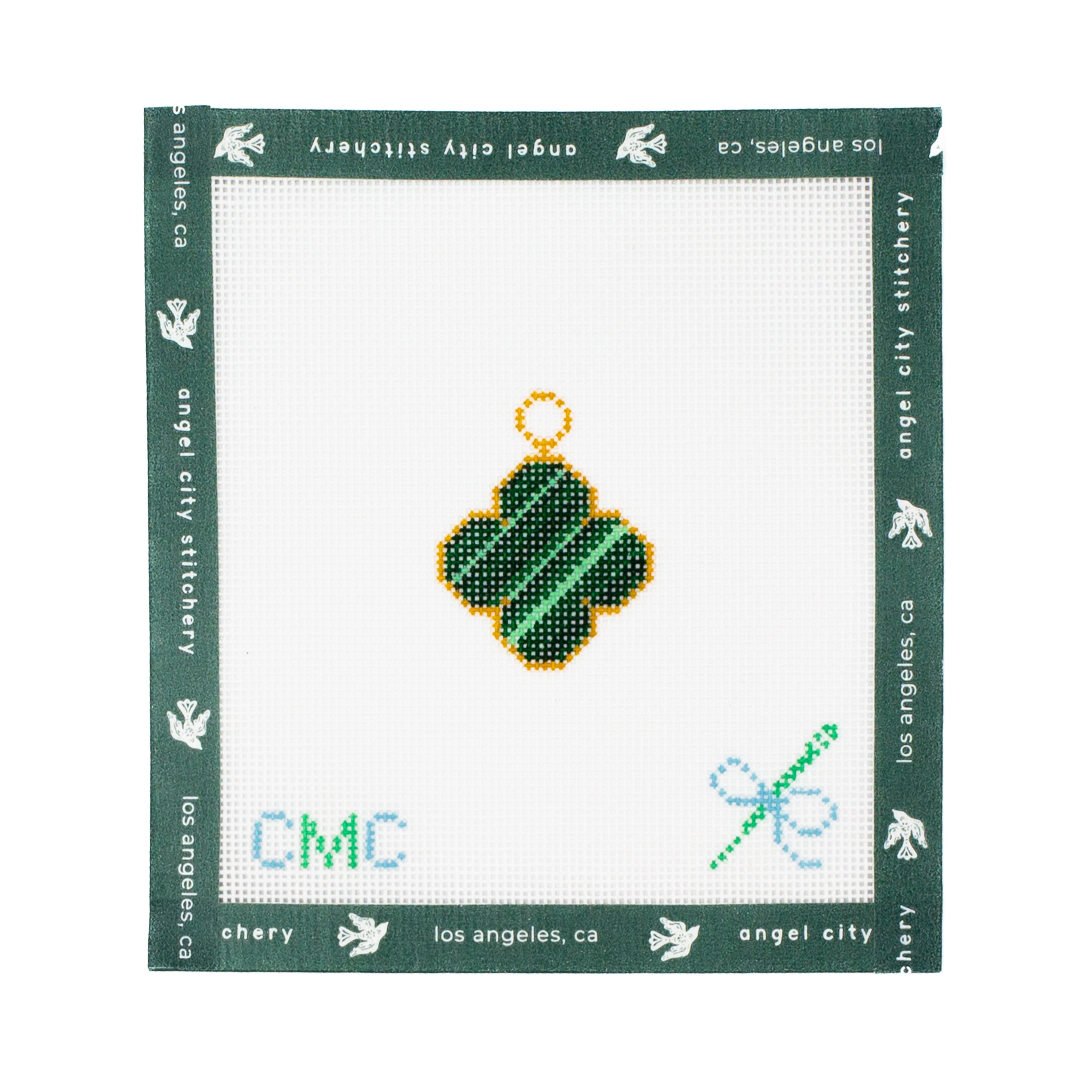 Embroidery canvas 4 leaf clover design on a white fabric with green border, featuring 'angel city stitchery' branding.