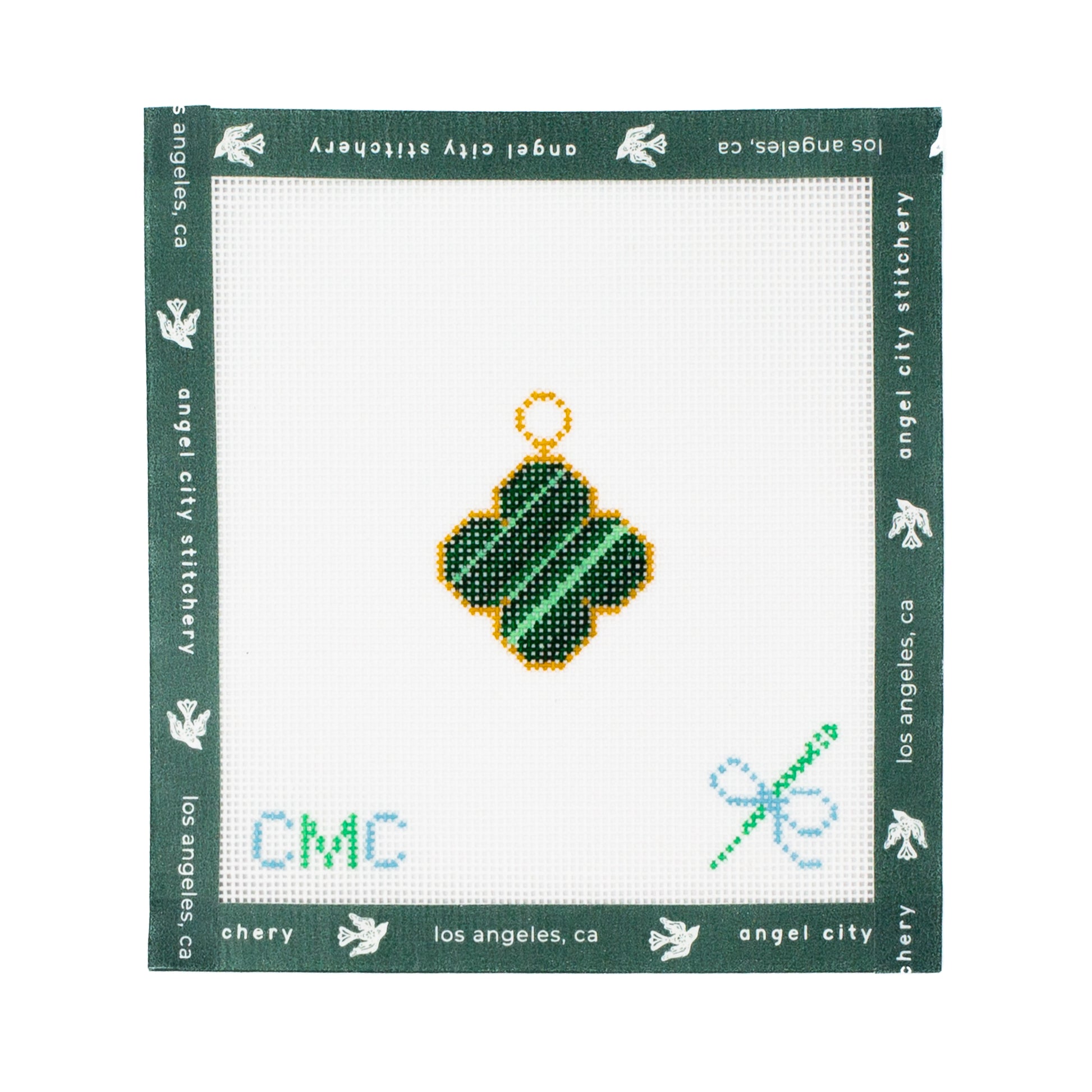 Embroidery canvas 4 leaf clover design on a white fabric with green border, featuring 'angel city stitchery' branding.