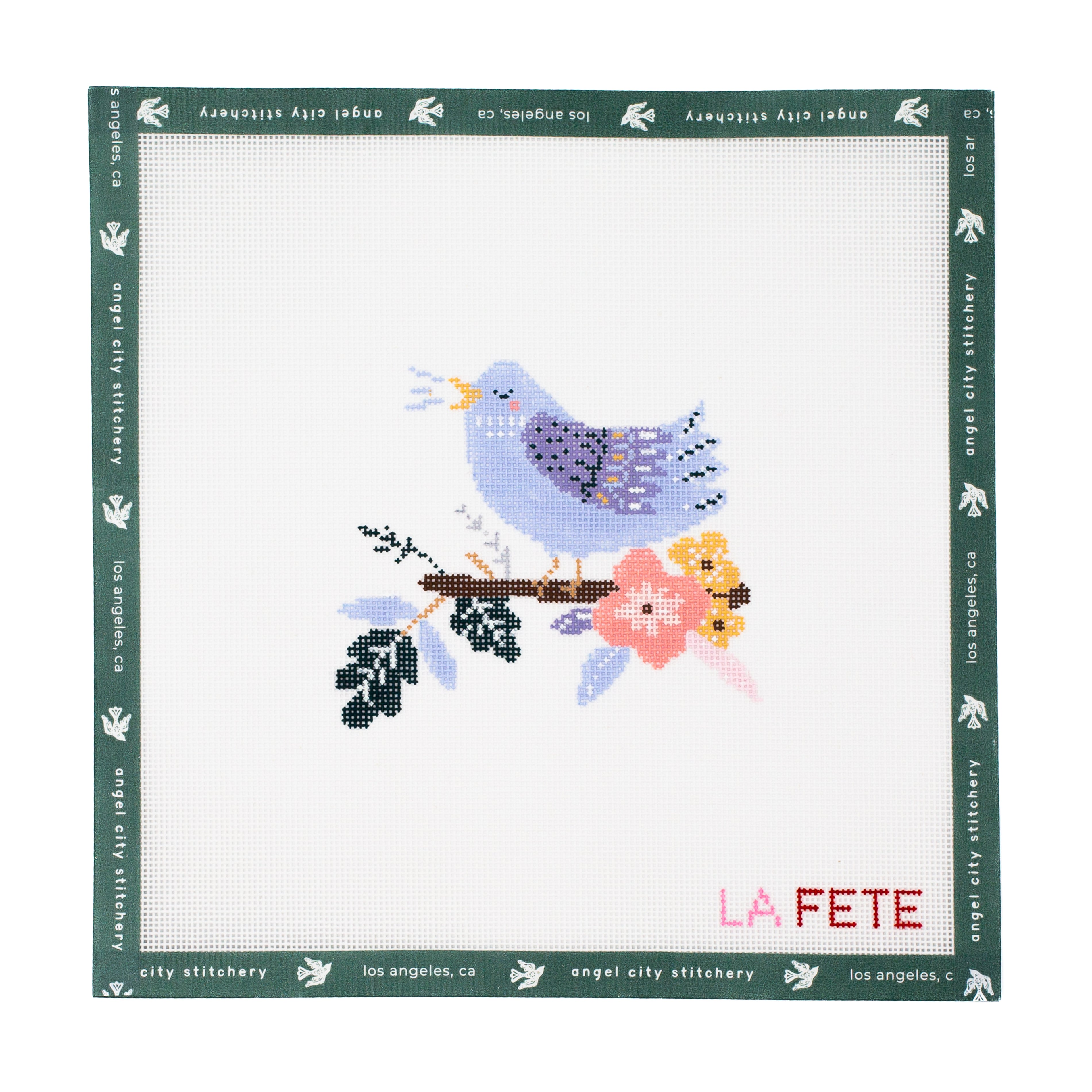 Embroidery canvas pattern with a calling bird and flowers on a white fabric background, featuring 'La Fete' branding.