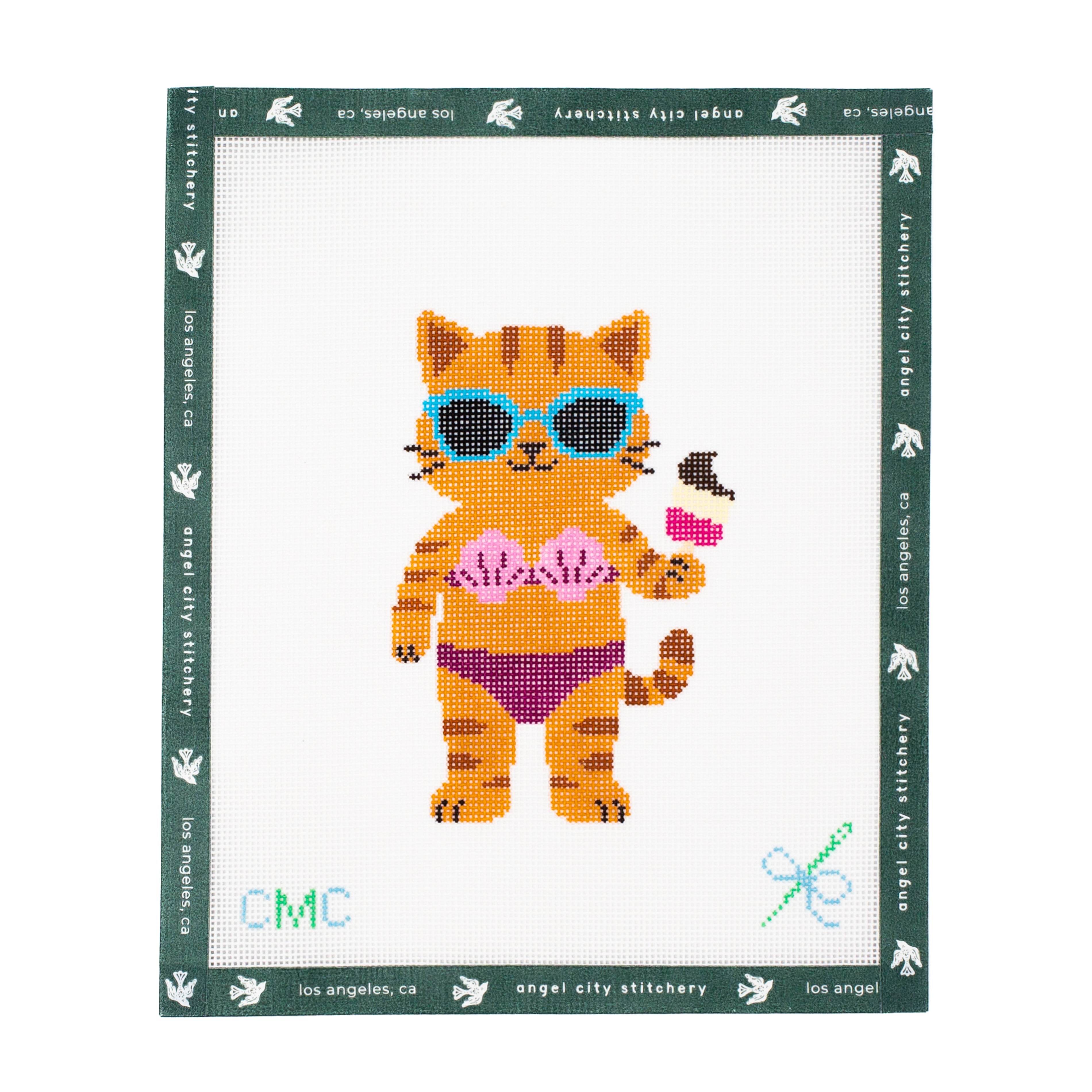 Embroidery canvas pattern of a cat in sunglasses and a bikini with 'Angel City Stitchery' branding.
