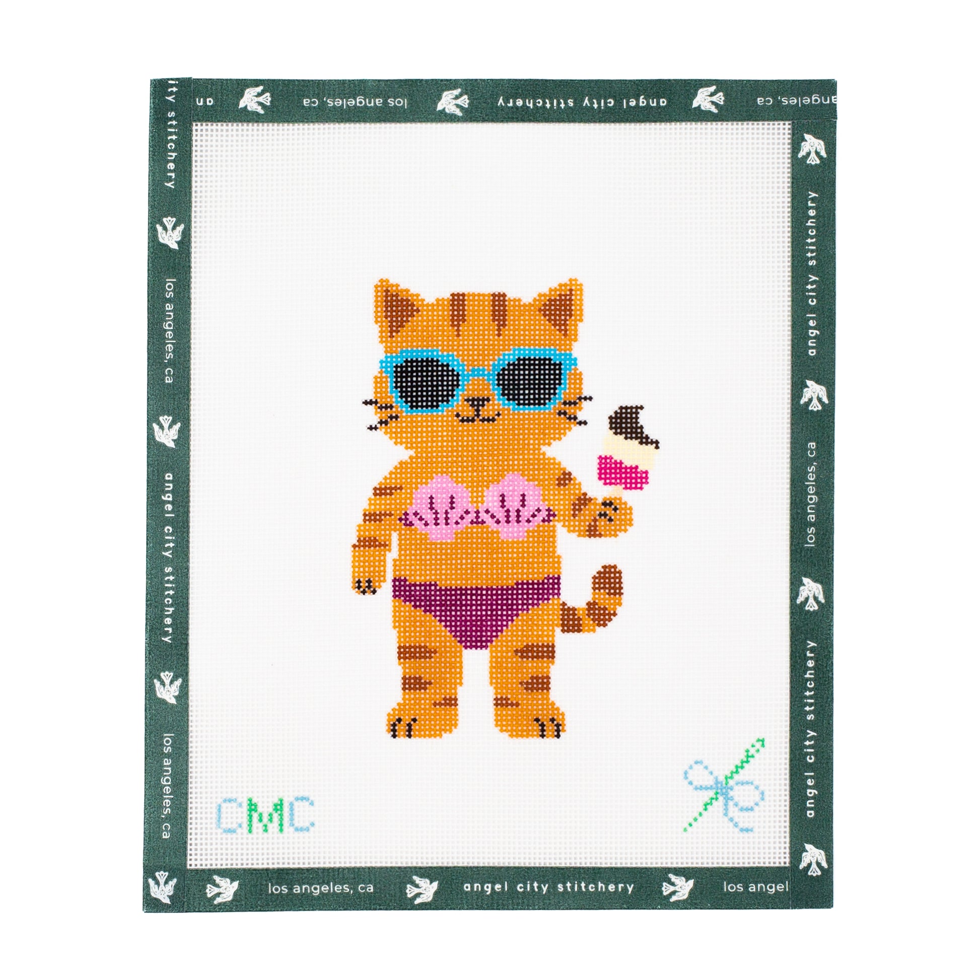 Embroidery canvas pattern of a cat in sunglasses and a bikini with 'Angel City Stitchery' branding.