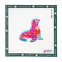 Embroidery canvas pattern with a pink and blue seal design on a white background