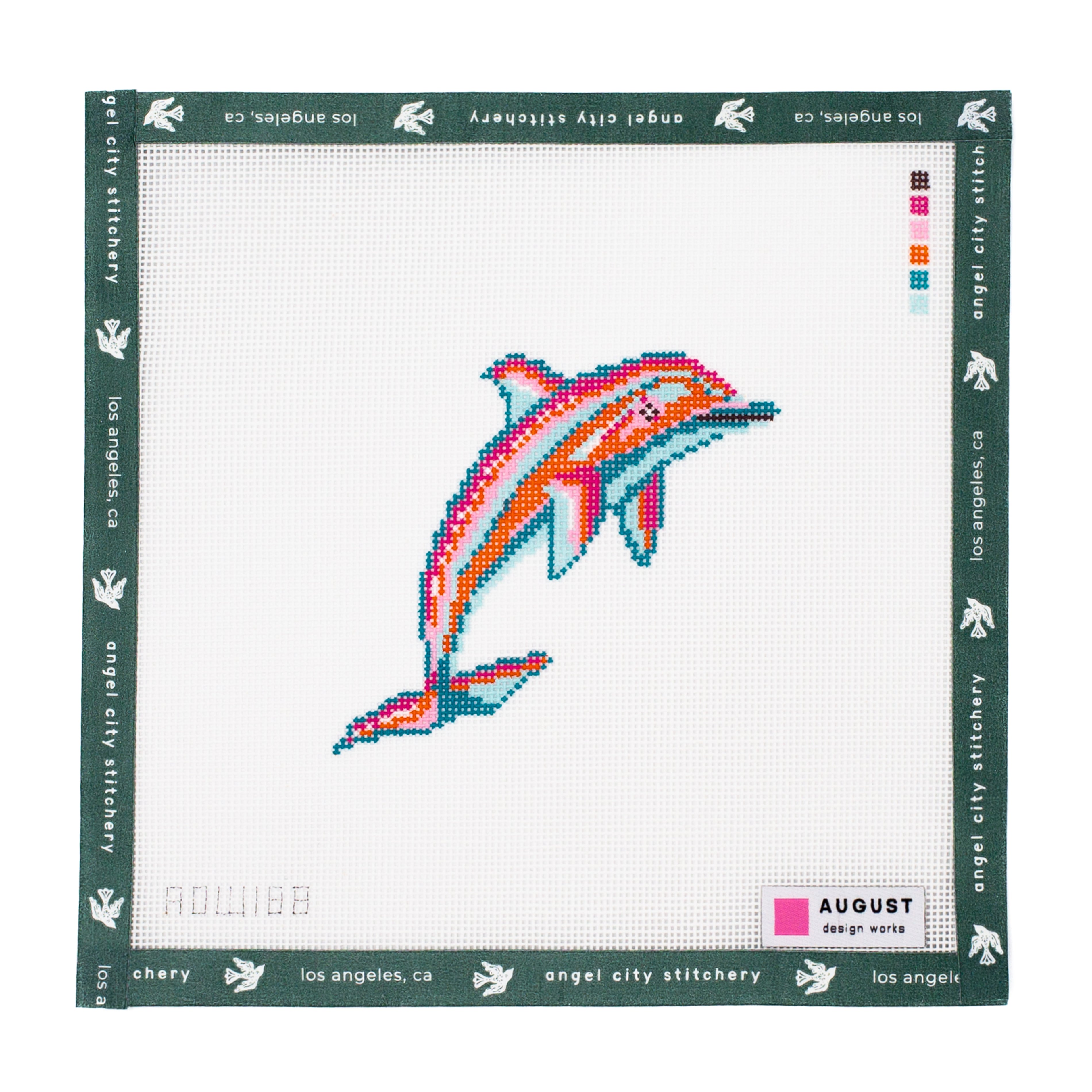Embroidery canvas pattern with a colorful dolphin design on a white fabric background.