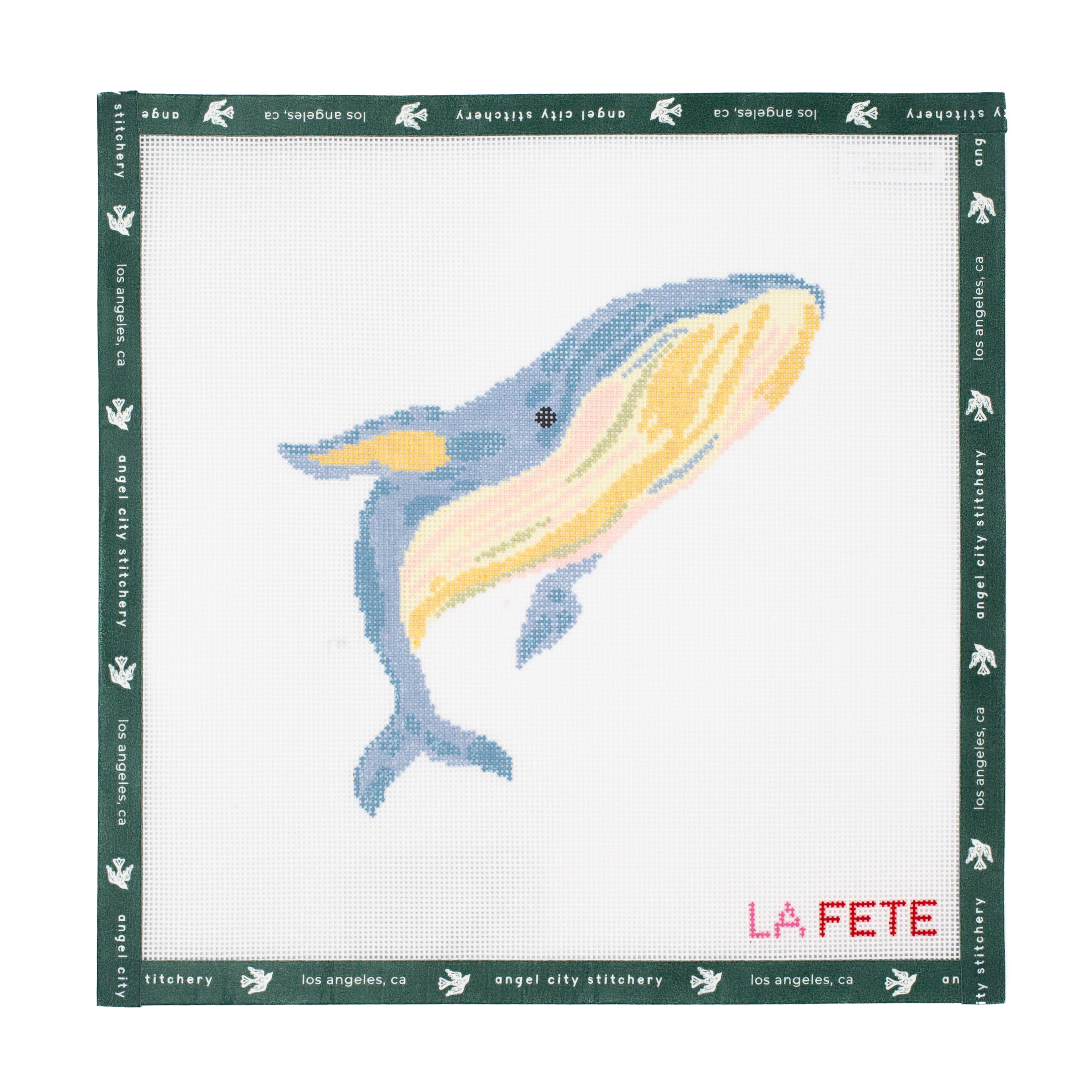 Needlepoint canvas whale design on a white background with 'La Fete' branding.