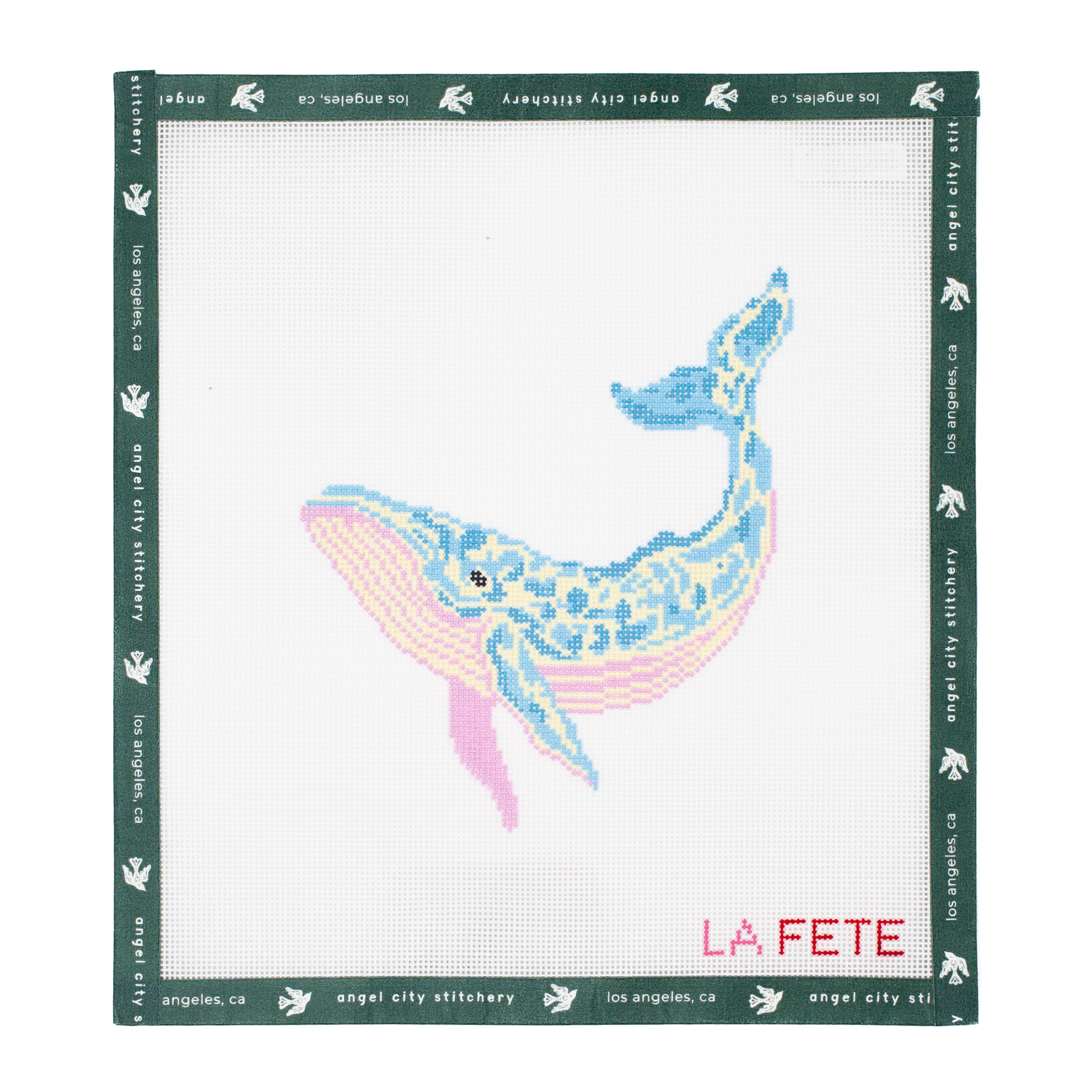 Embroidery canvas pattern of a whale with 'La Fete' branding on a white background