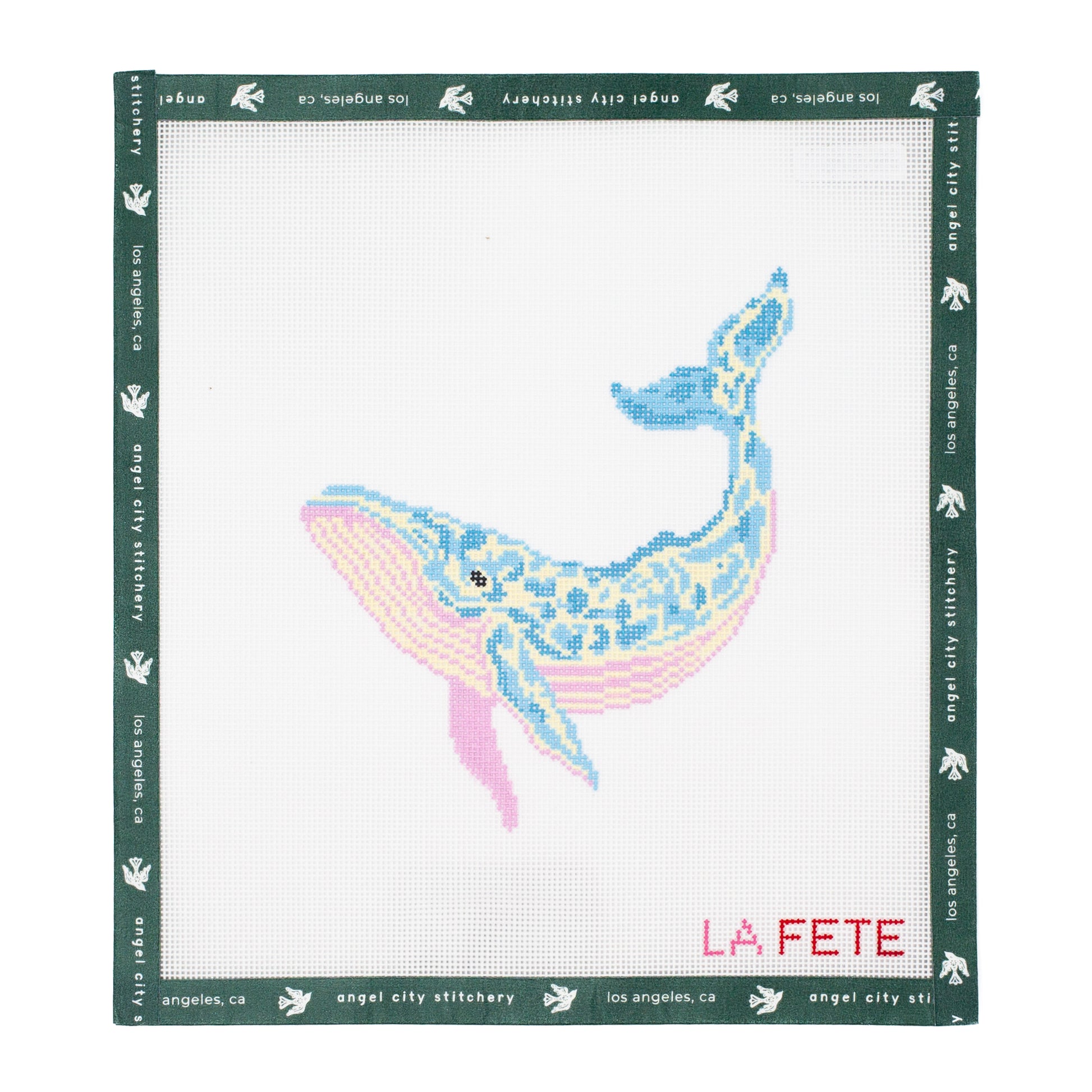 Embroidery canvas pattern of a whale with 'La Fete' branding on a white background