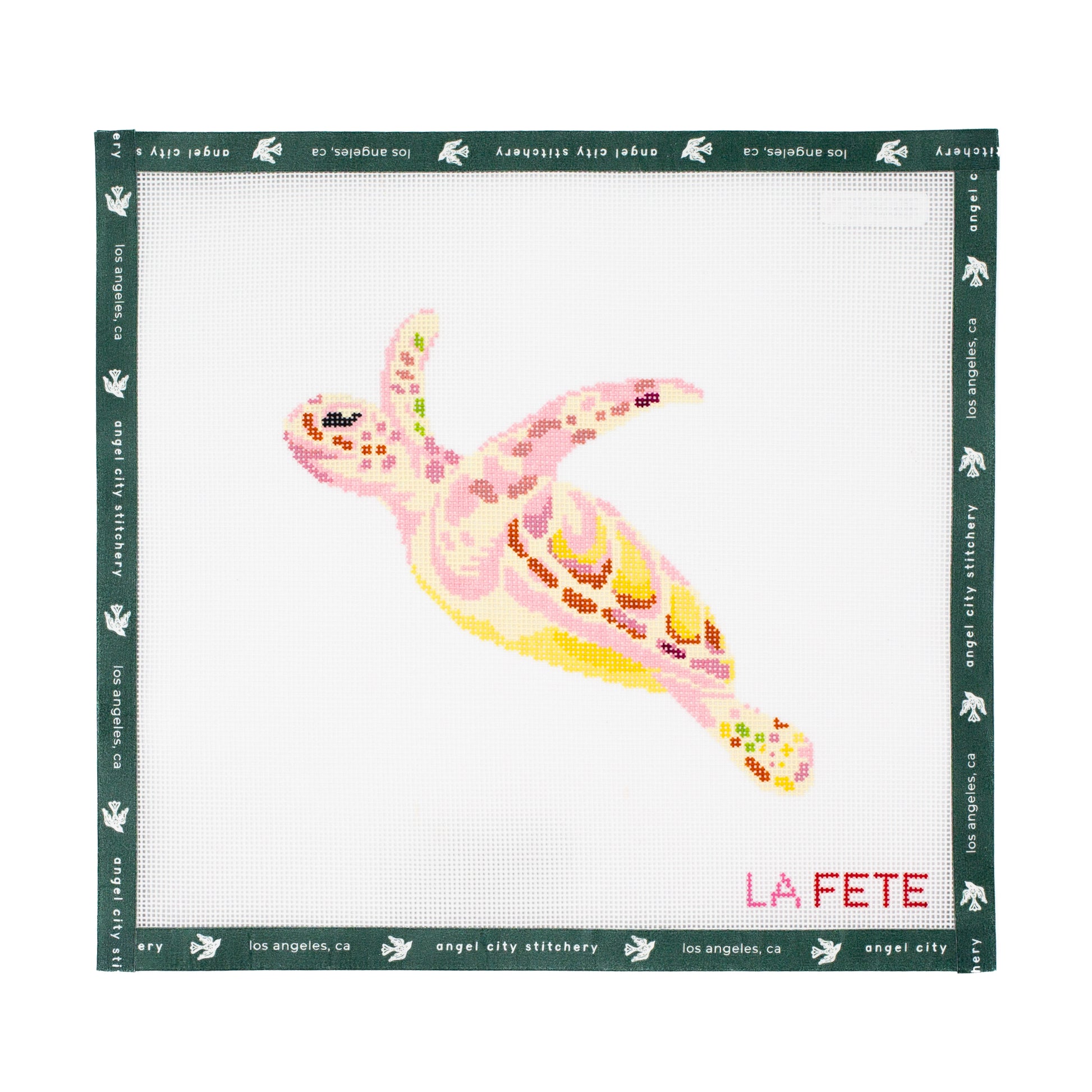 Needlepoint canvas pattern with a colorful turtle design on a white background, featuring the brand 'Angel City Stitchery'.