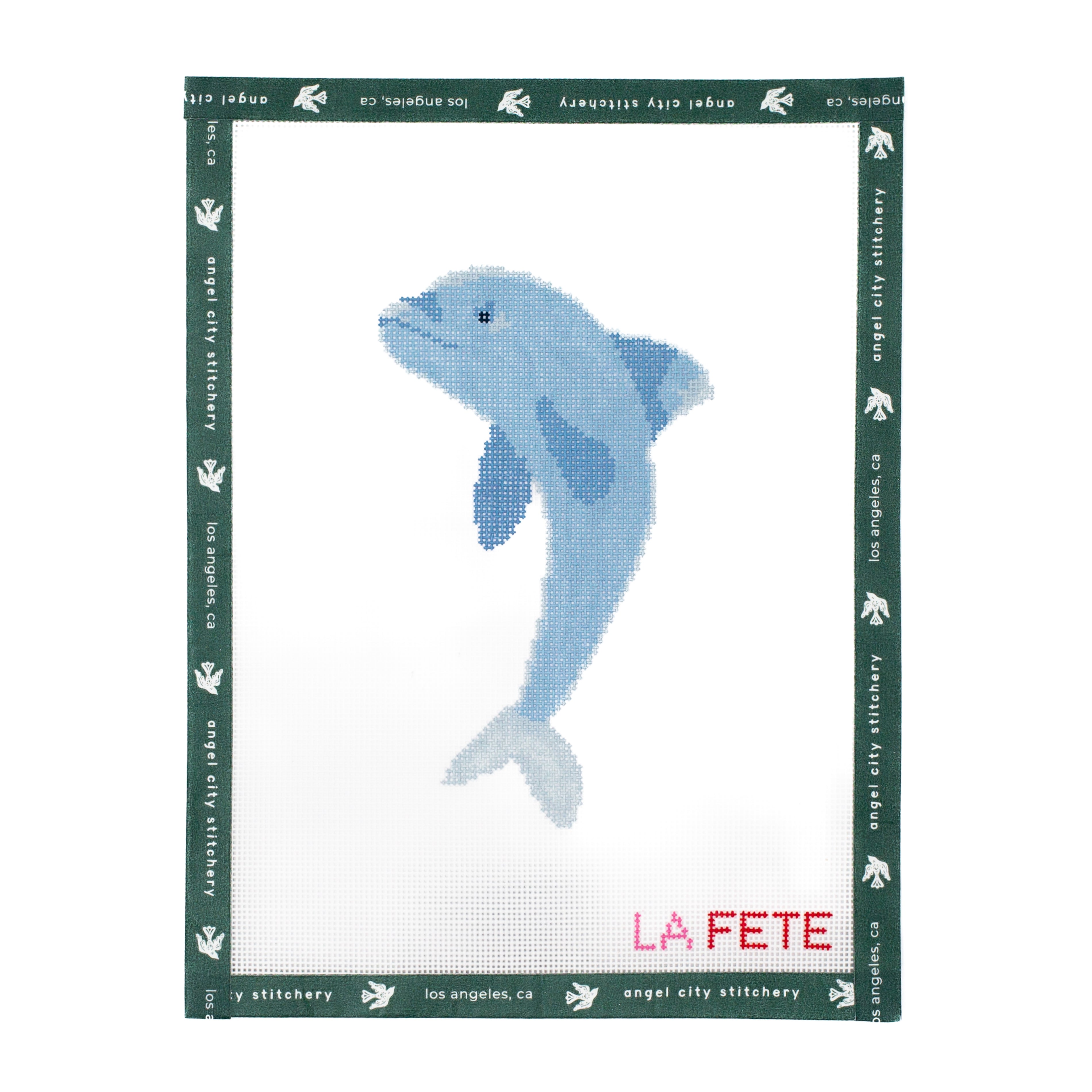 Embroidery canvas Blue dolphin design on a cross-stitch pattern with 'La Fete' branding.