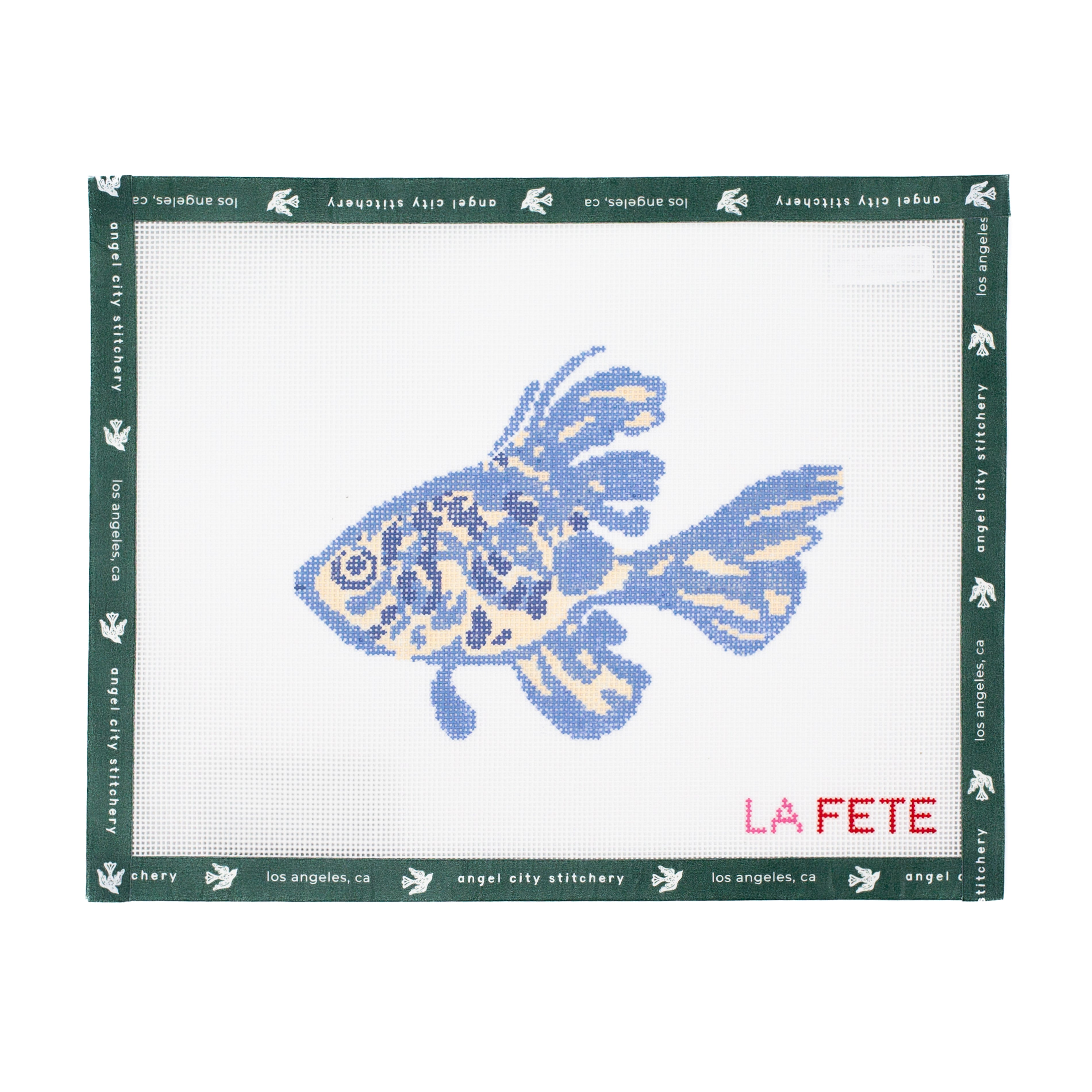 Needlepoint canvas blue fish design with 'La Fete' branding