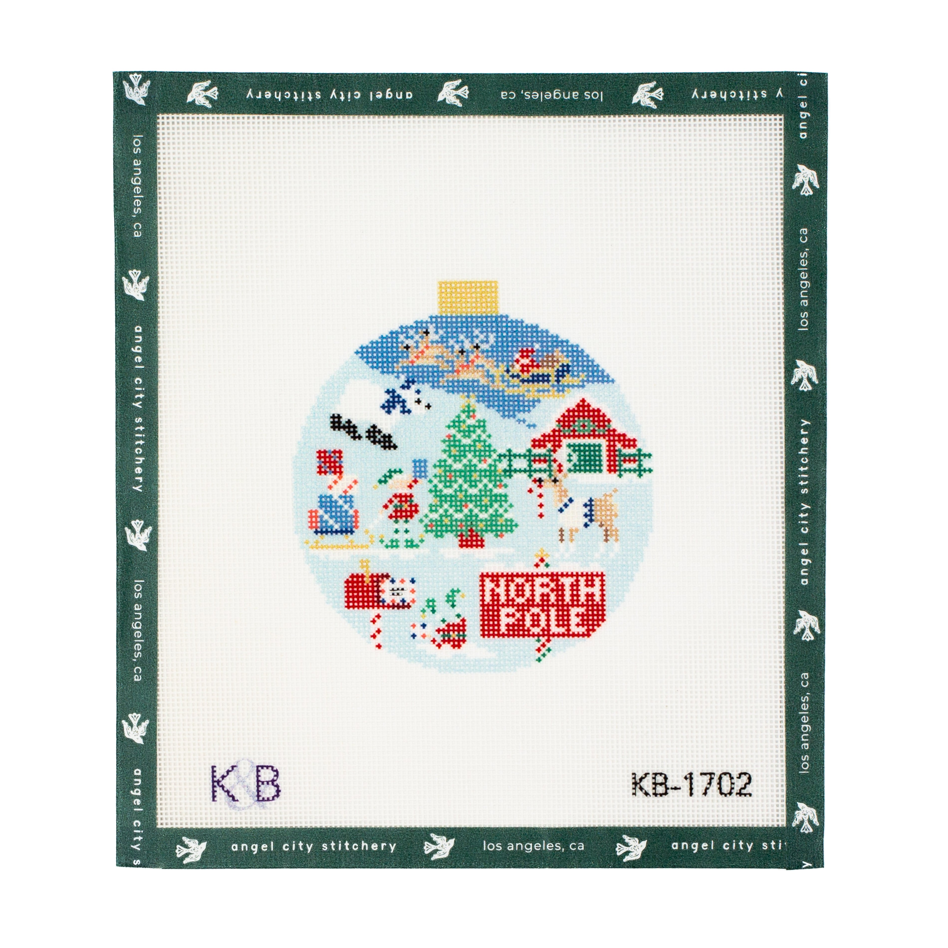 Needlepoint canvas design of a Christmas ornament with festive scenes on a white background.