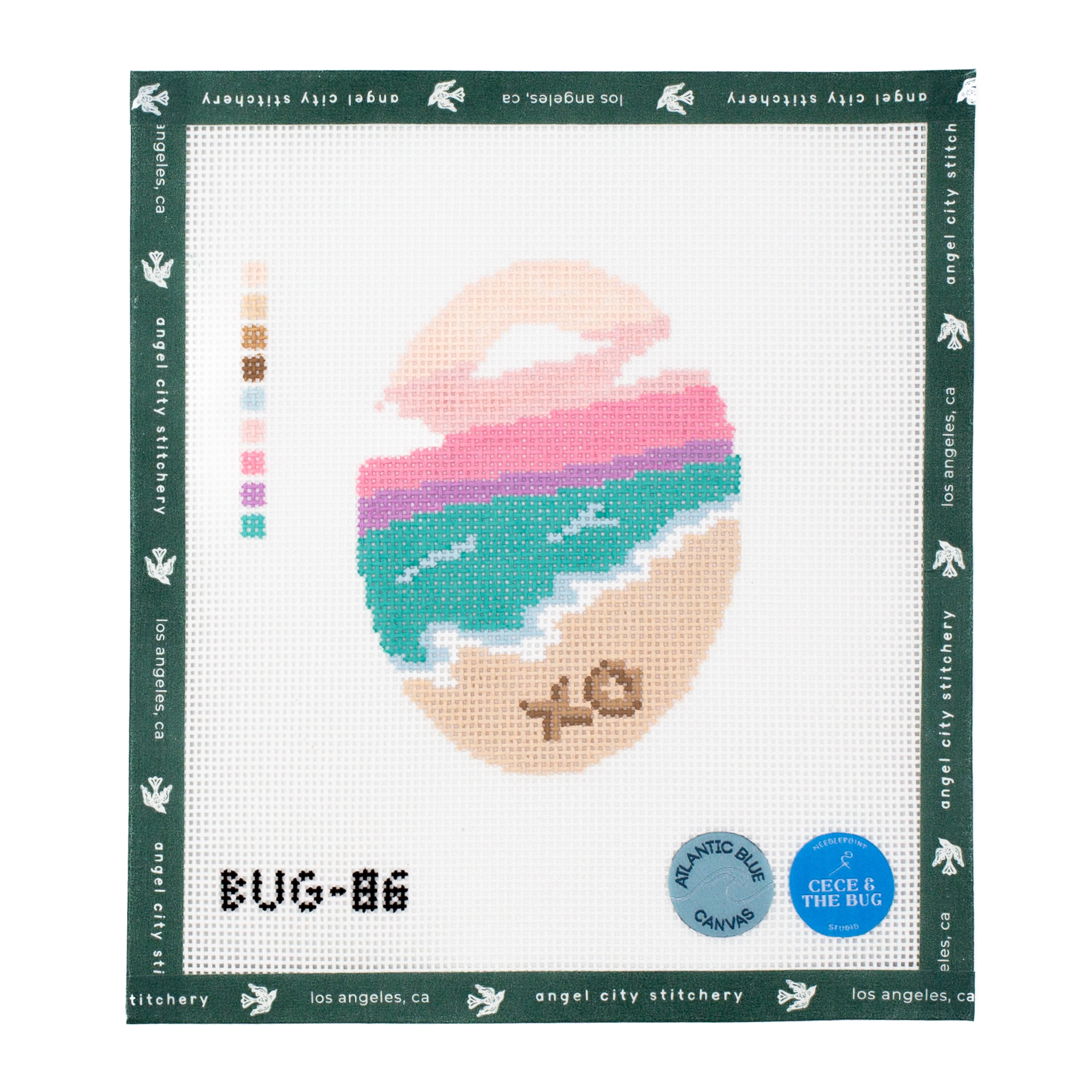 Needlepoint pattern of a beach with 'XO' and 'BUG-B6' text, framed by angel city stitchery branding.