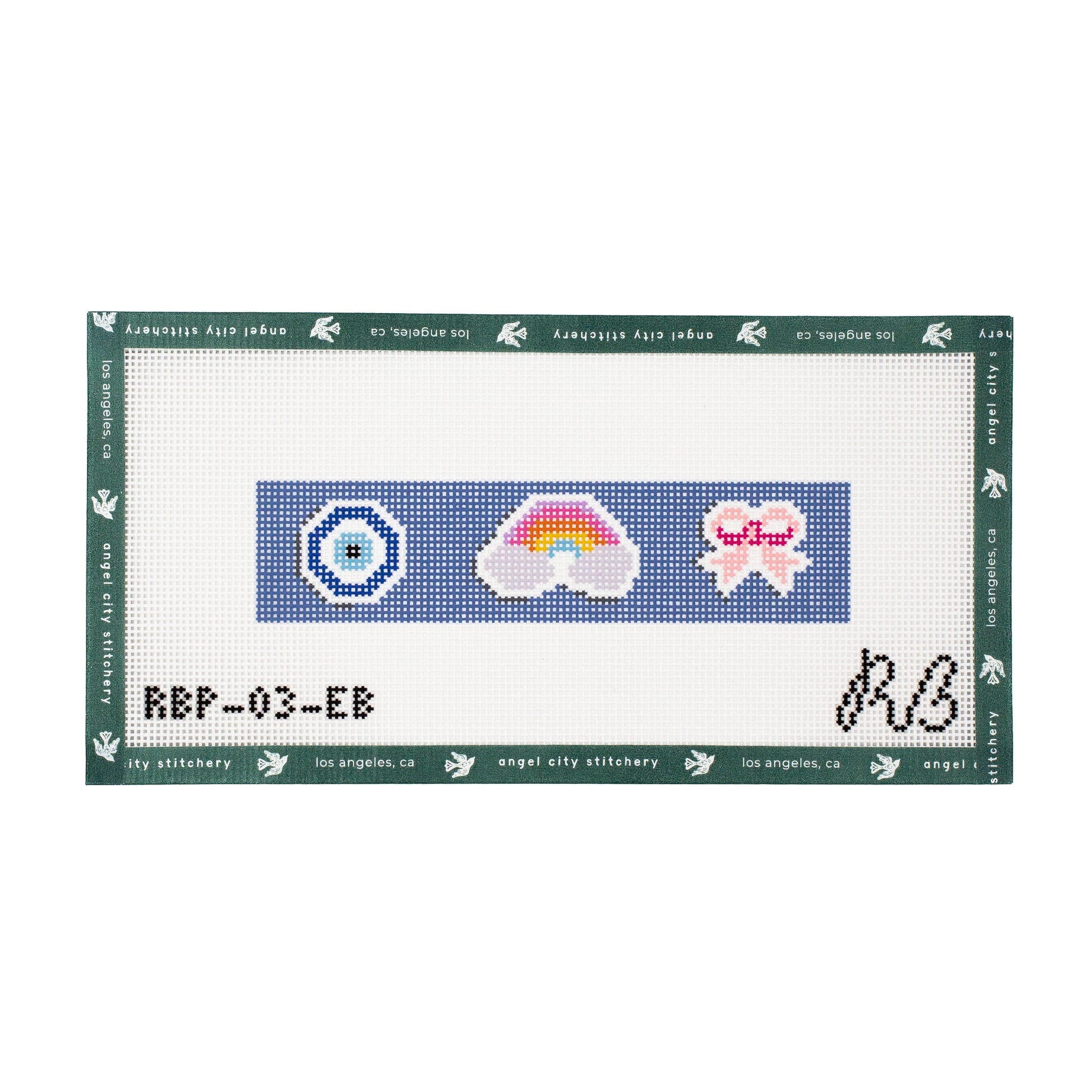 A needlepoint canvas design by Angel City Stitchery, featuring three horizontal rows of pixelated designs: a blue target, a pink and yellow rainbow, and a pink bow. 