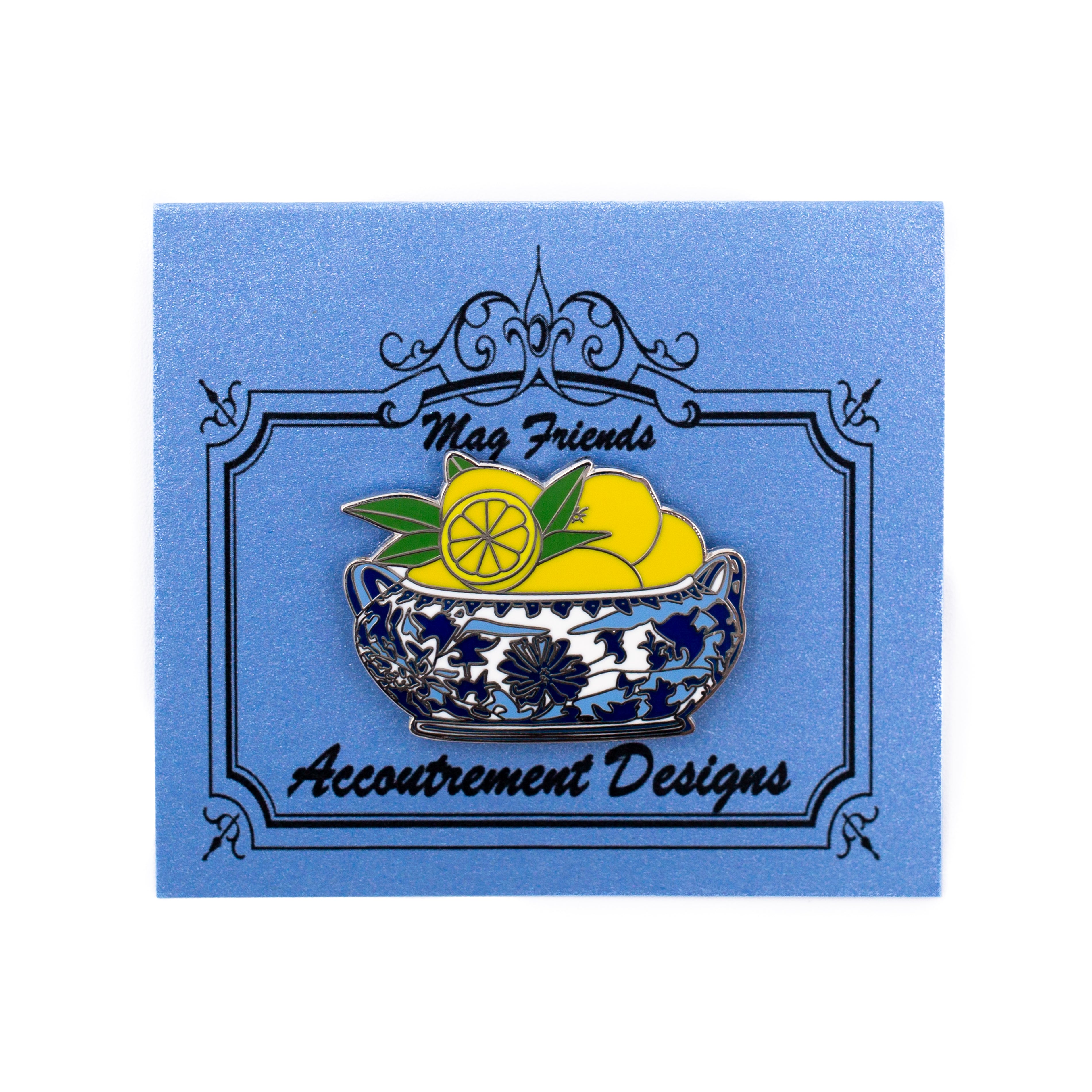 Lemons in a blue and white bowl enamel pin by Angel City Stitchery
