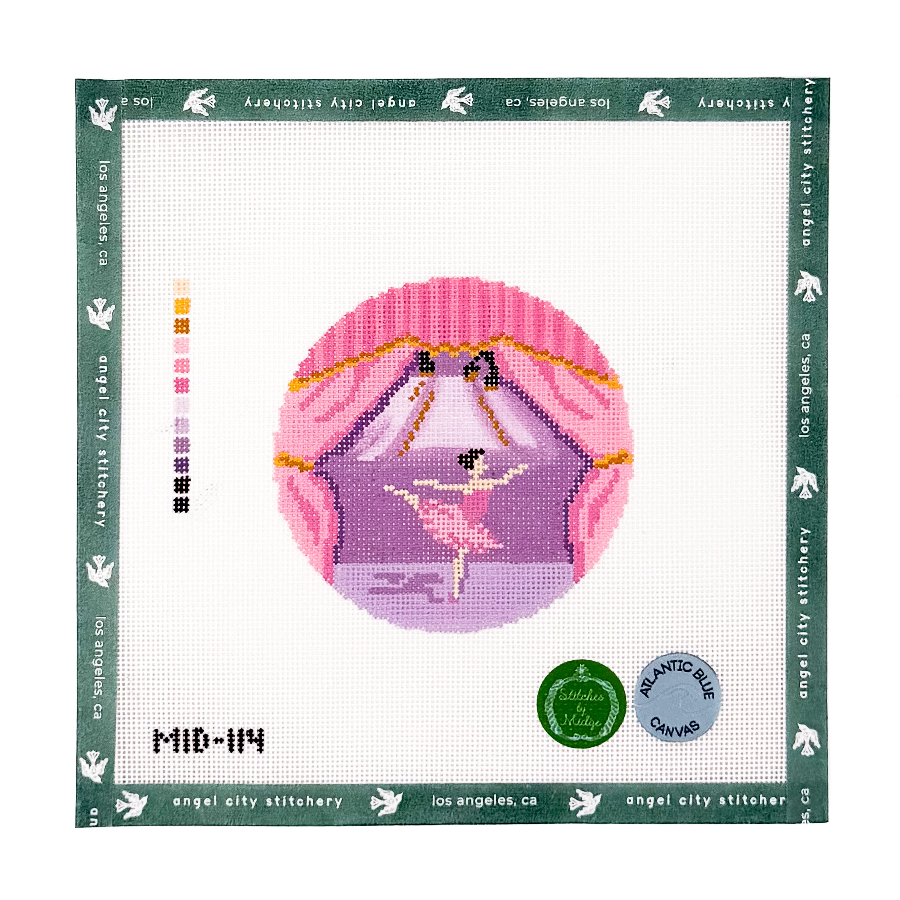 Circular needlepoint canvas featuring a ballerina dancing on a stage framed by pink stage curtains