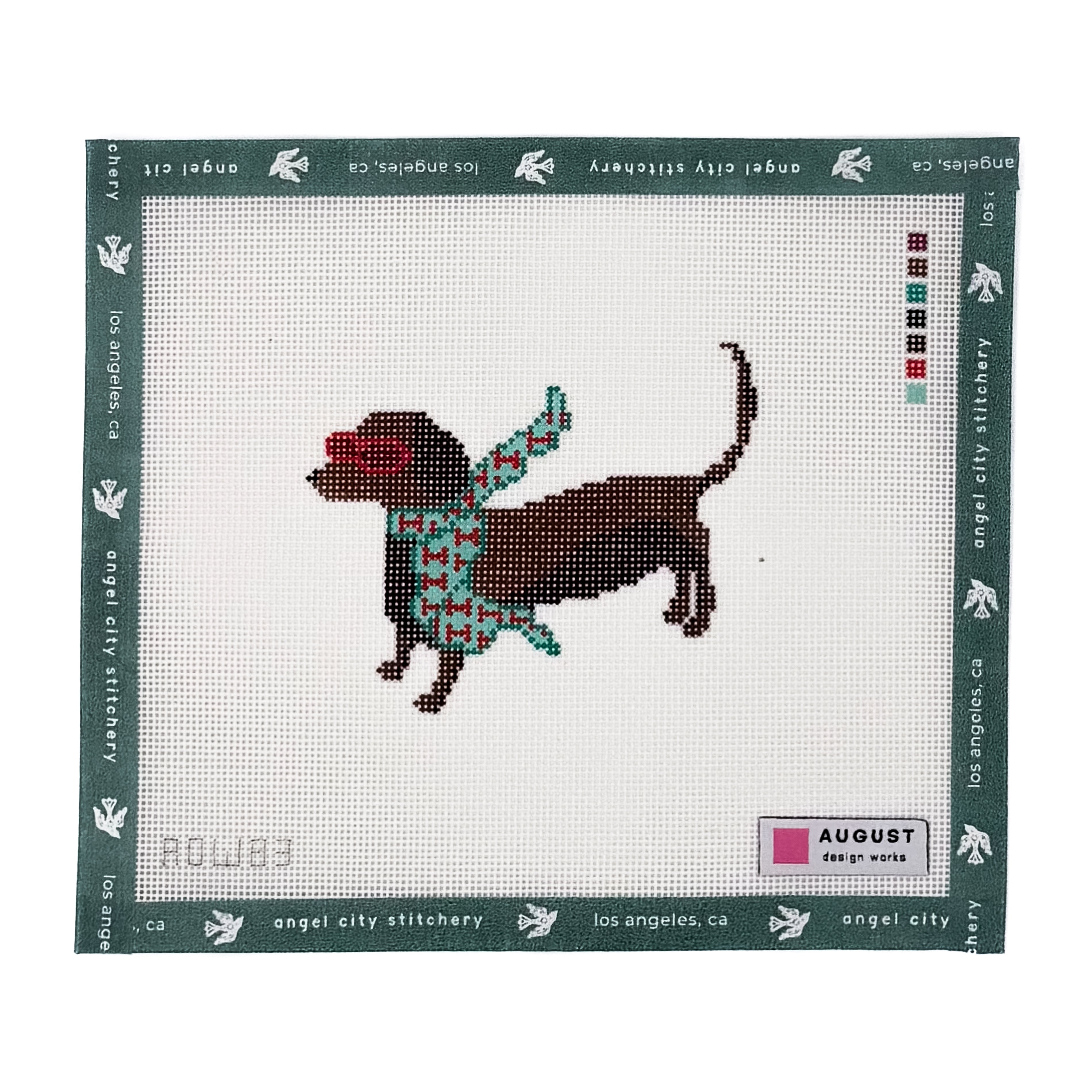 Brown dachshund wearing red sunglasses and a teal bone-patterned scarf needlepoint canvas by August Design Works for Angel City Stitchery
