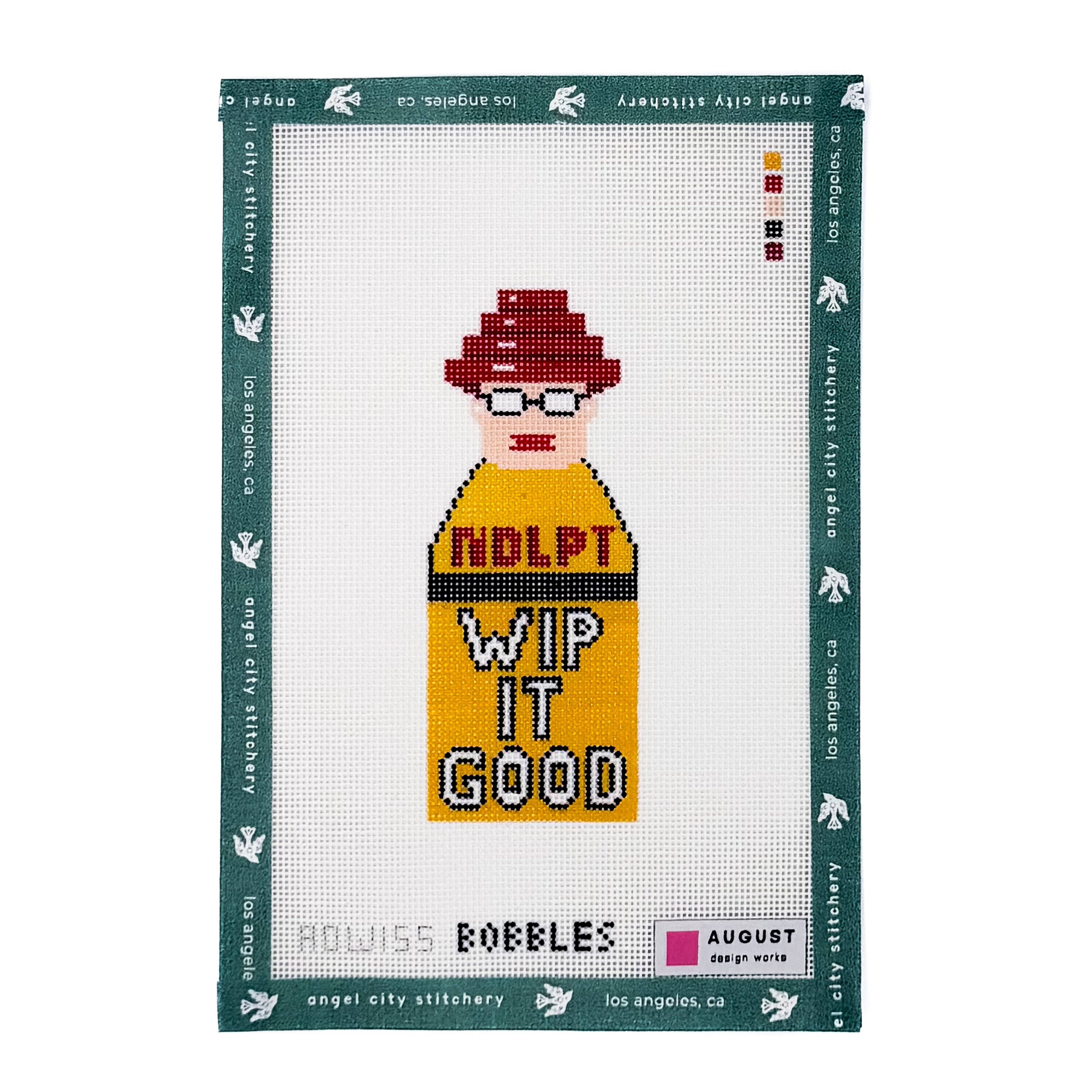 NDLPT WIP IT GOOD needlepoint canvas with a figure wearing a red hat and yellow shirt