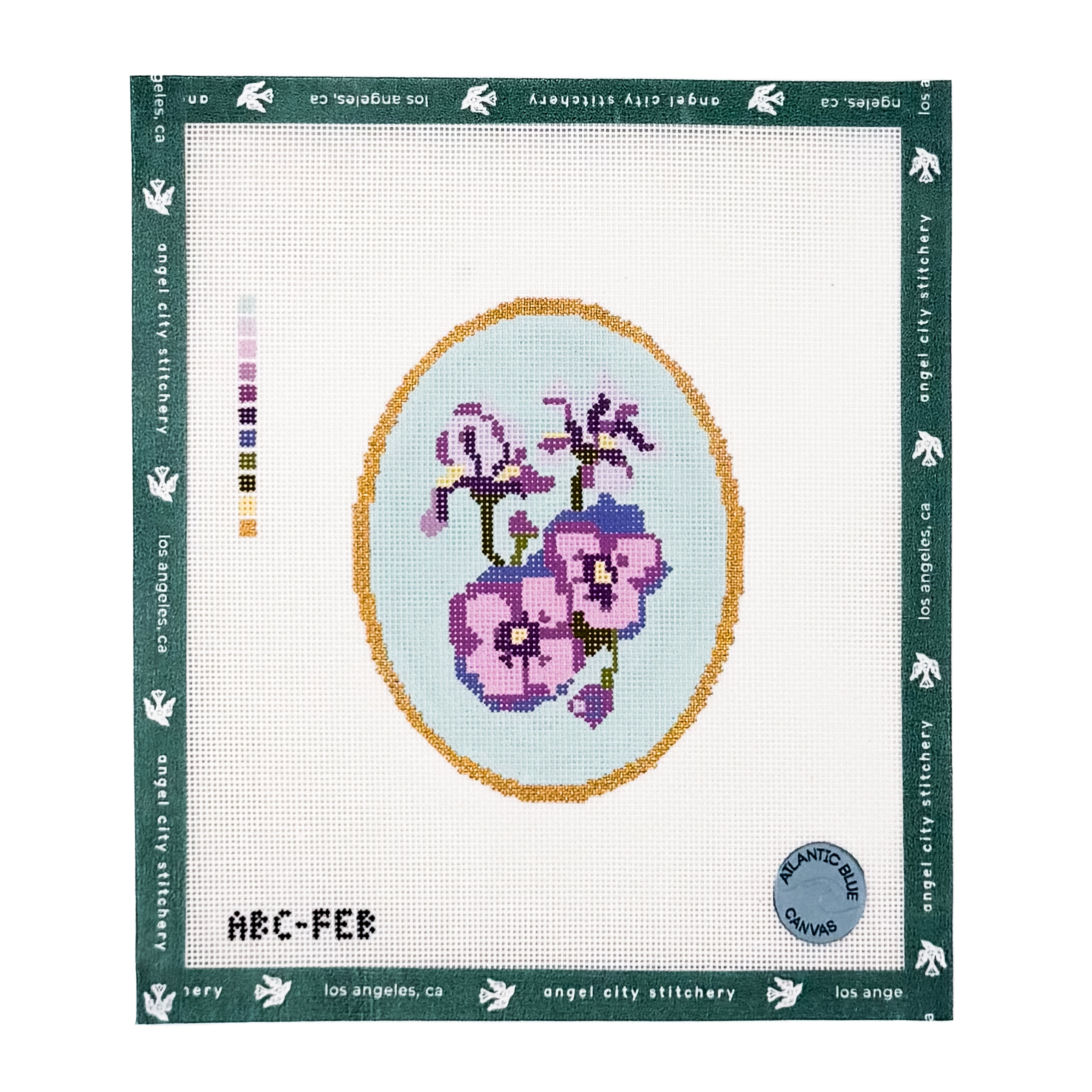 Purple and lilac floral bouquet inside an oval gold frame needlepoint canvas