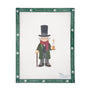 Ebenezer Scrooge character wearing a top hat, green coat, red scarf, and holding a cane and a lit candle needlepoint canvas by Angel City Stitchery